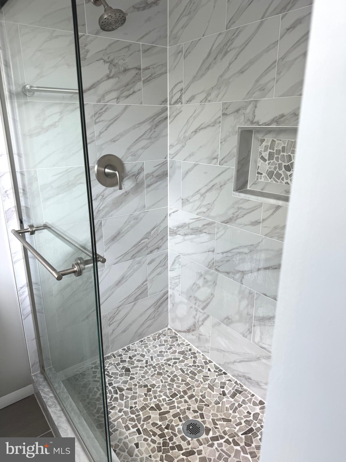 8018 Valley Manor Road, Unit 3B Owings Mills, MD 21117 - Photo 38 of 51 Custom walk in shower with gorgeous tile work