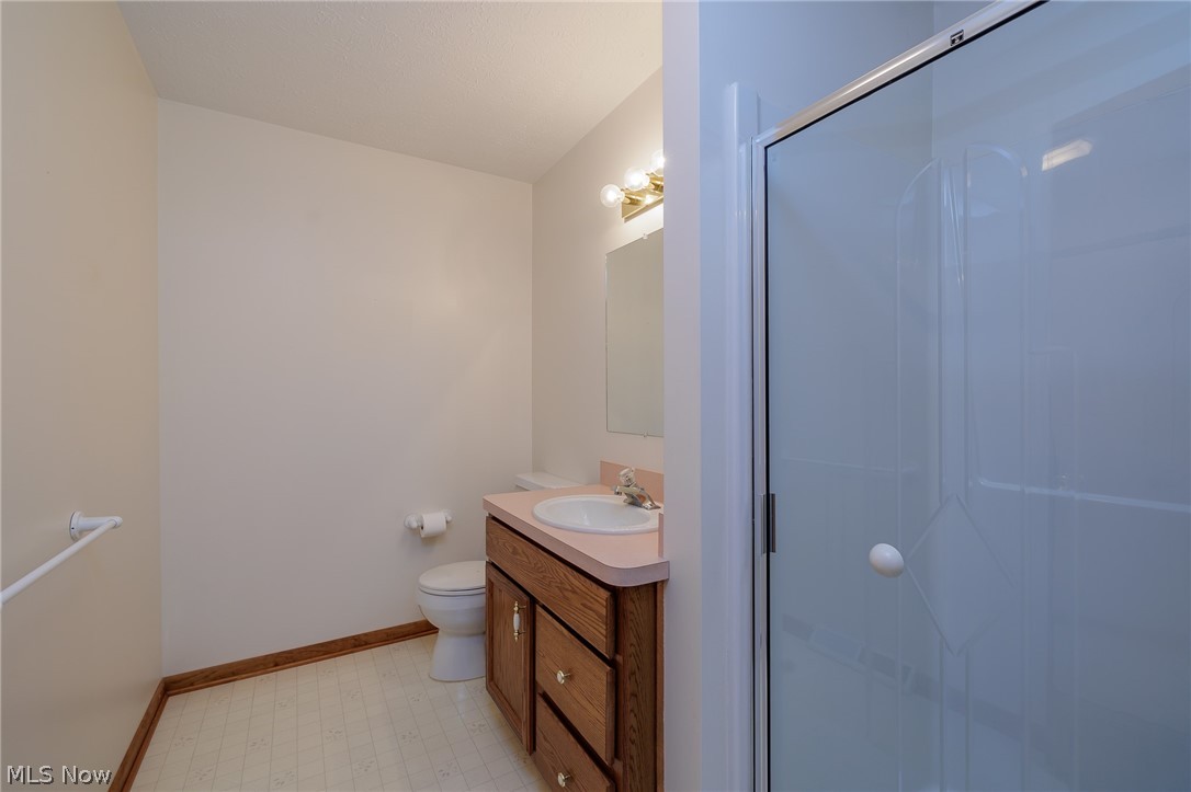 39816 Butternut Ridge Road Elyria, OH 44035 - Photo 30 of 45 Bathroom with tile patterned floors, vanity, and toilet