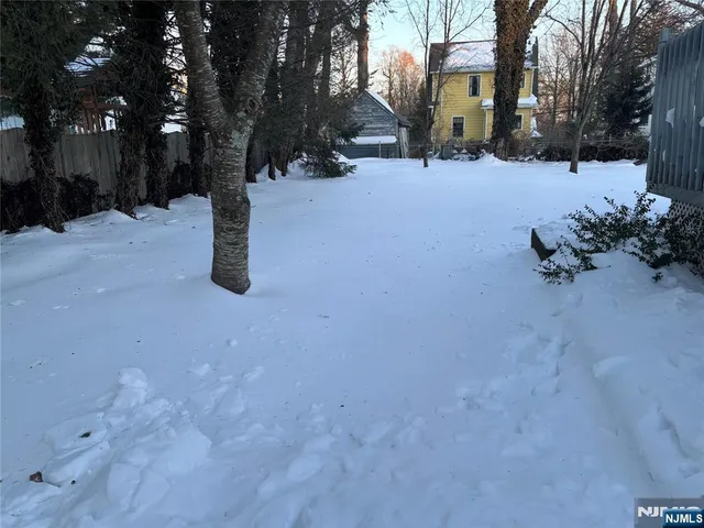 a street view covered with snow