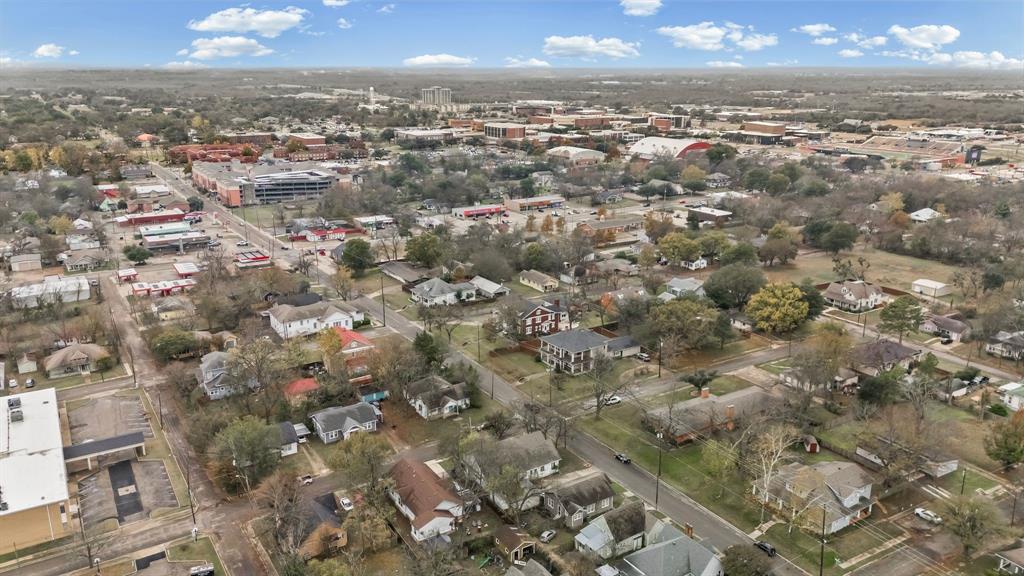 1406 Sycamore Street Commerce, TX 75428 - Photo 13 of 22 an aerial view of multiple house