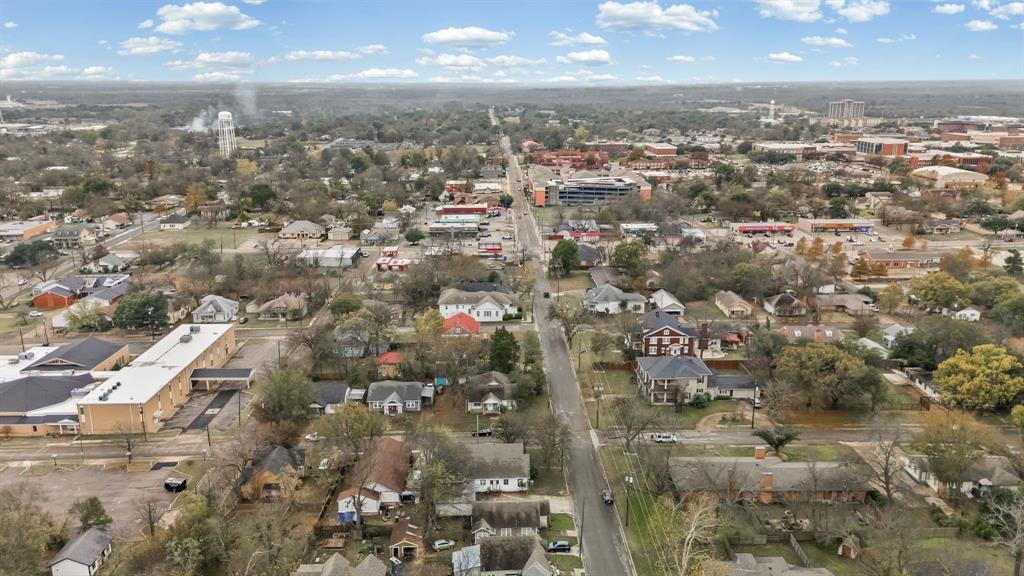 1406 Sycamore Street Commerce, TX 75428 - Photo 15 of 22 an aerial view of a city
