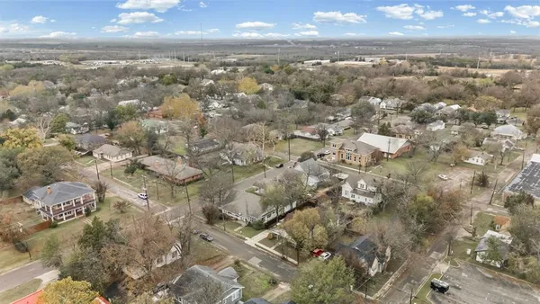 a view of city and green space