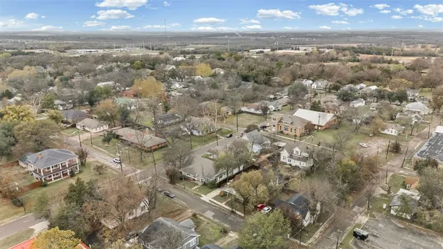 a view of city and green space