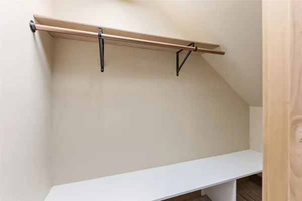 a view of small space with racks on the wall