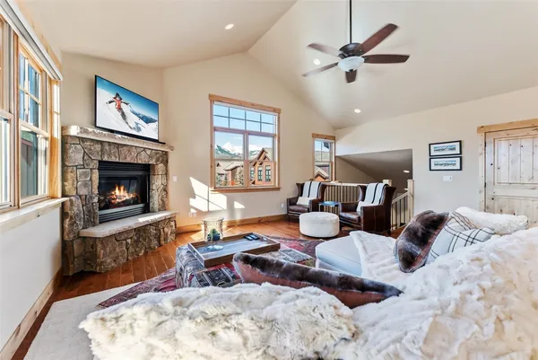 a bed room with furniture and a fireplace