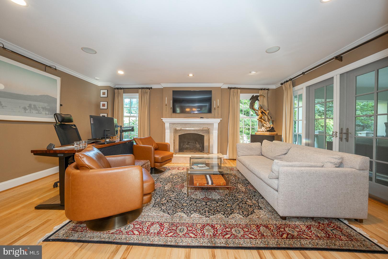318 Chamounix Road Wayne, PA 19087 - Photo 22 of 55 a living room with furniture and a fireplace
