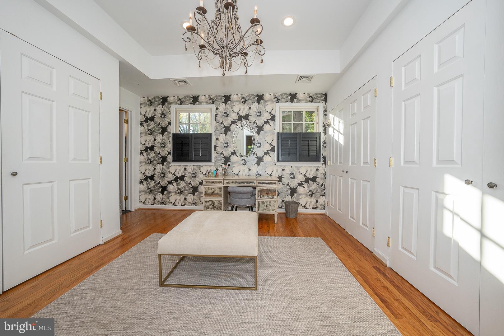 318 Chamounix Road Wayne, PA 19087 - Photo 29 of 55 a living room with fireplace furniture and a chandelier