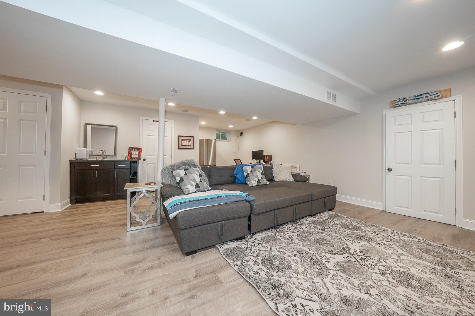 318 Chamounix Road Wayne, PA 19087 - Photo 38 of 55 a living room with furniture and a wooden floor
