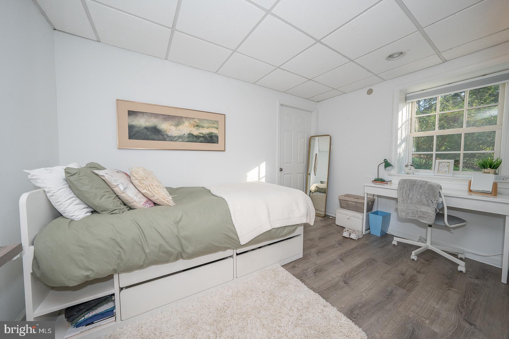 318 Chamounix Road Wayne, PA 19087 - Photo 42 of 55 a bedroom with a bed and a couch