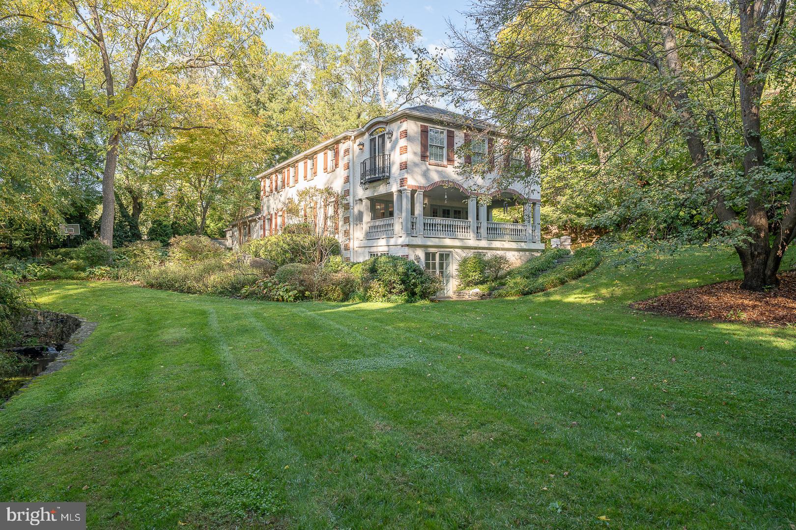 318 Chamounix Road Wayne, PA 19087 - Photo 46 of 55 a front view of a house with a yard