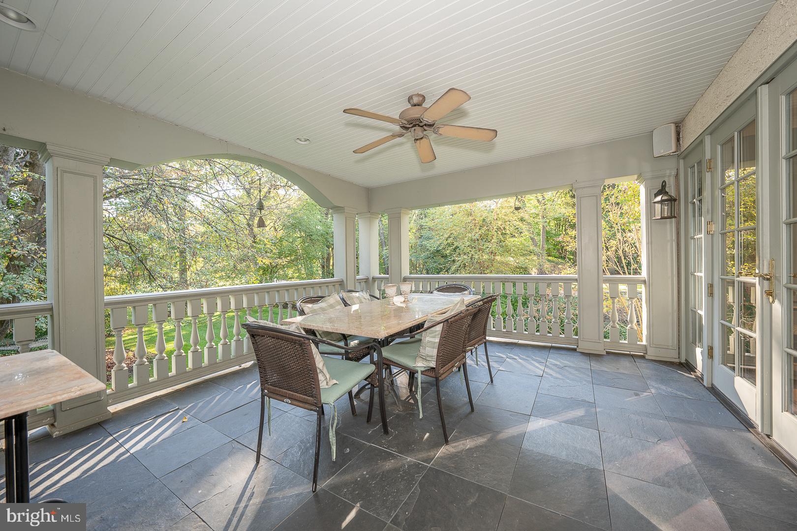 318 Chamounix Road Wayne, PA 19087 - Photo 47 of 55 a dining room with furniture a chandelier and a rug