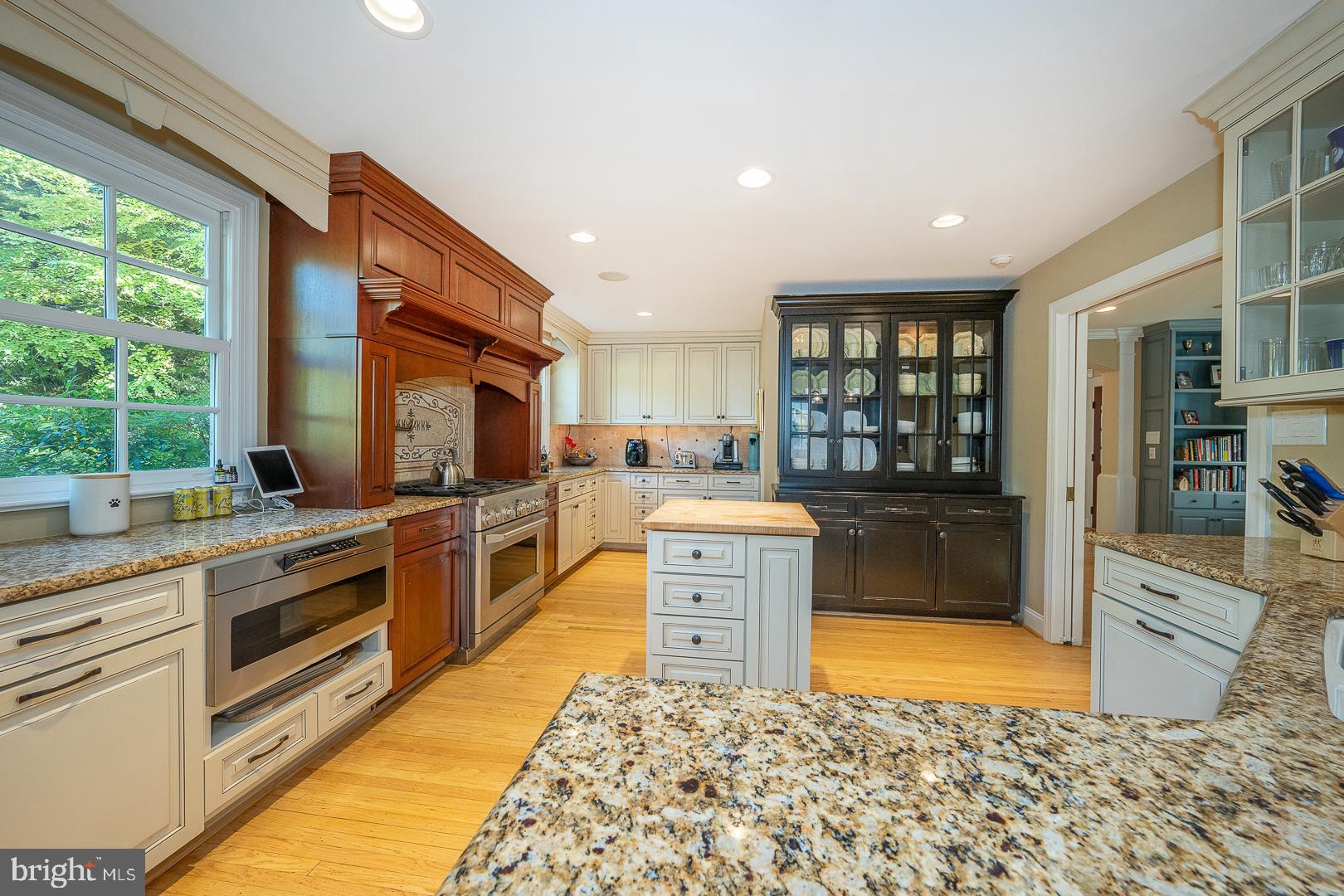 318 Chamounix Road Wayne, PA 19087 - Photo 9 of 55 a large kitchen with granite countertop a sink and cabinets