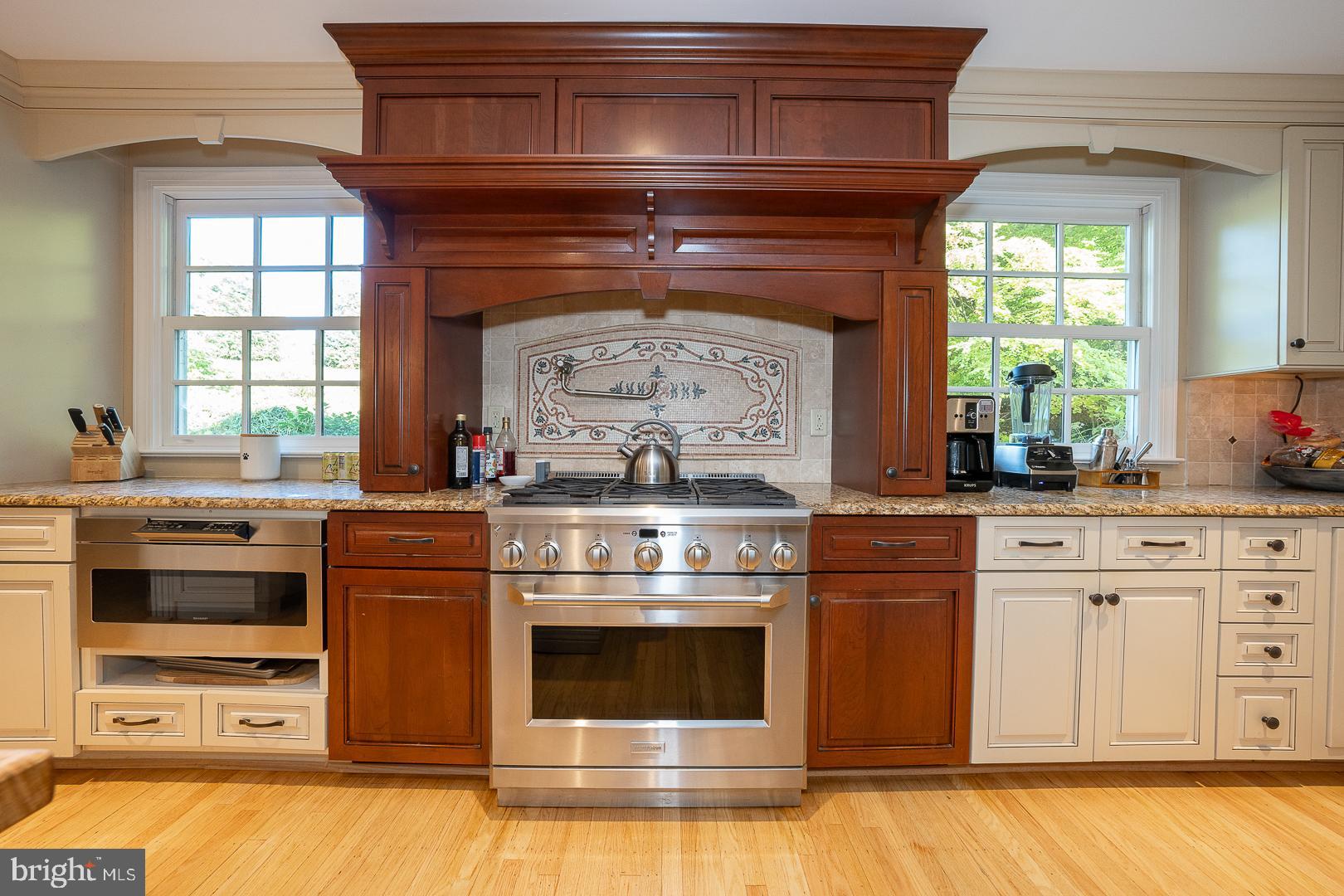 318 Chamounix Road Wayne, PA 19087 - Photo 10 of 55 a kitchen with stove and white cabinets