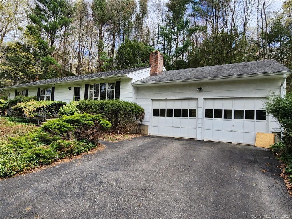 13 Pond Brook Road Newtown, CT 06470 - Photo 1 of 1 a view of a house with a yard