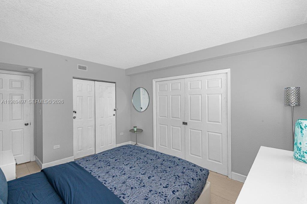 1500 Bay Road, Unit 128S Miami Beach, FL 33139 - Photo 5 of 27 a view of a bedroom
