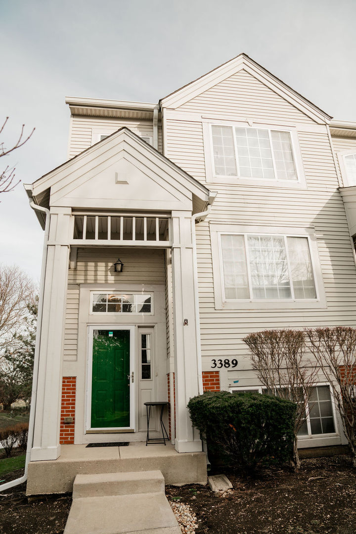a front view of a house with parking space