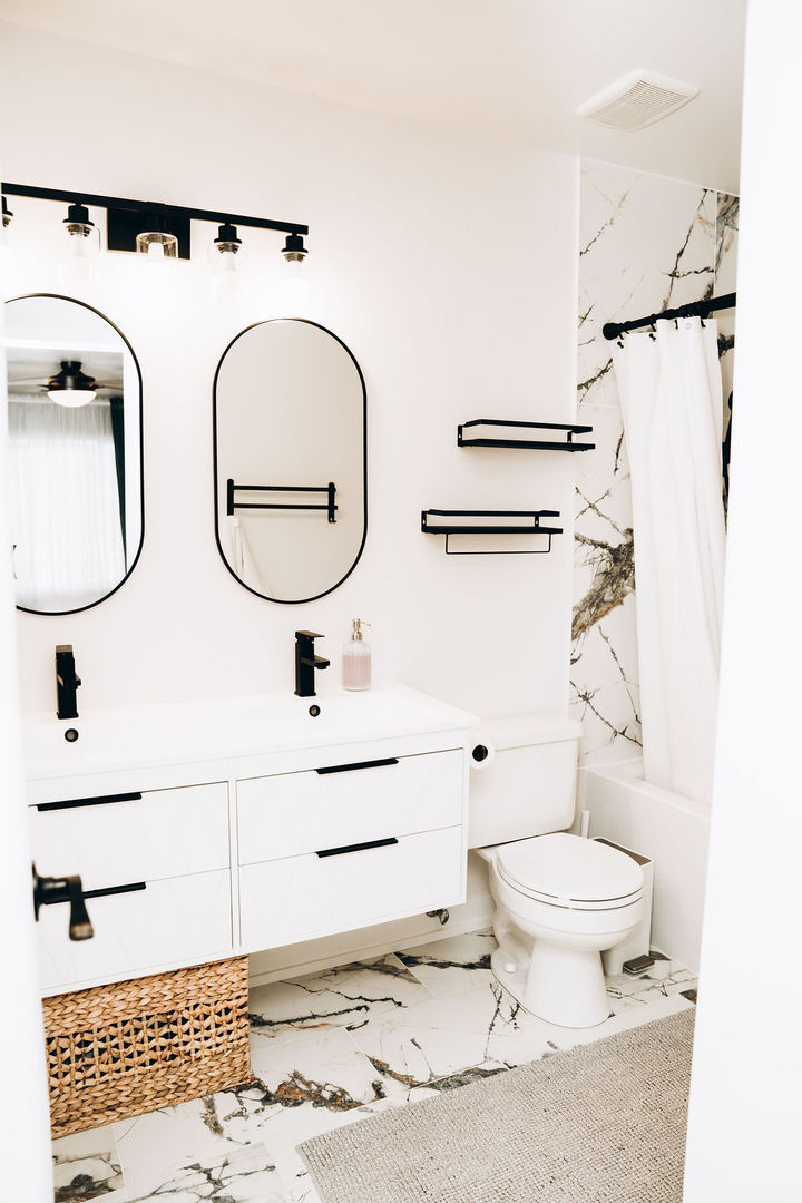 3389 Ravinia Circle Aurora, IL 60504 - Photo 21 of 39 a bathroom with a sink a toilet and a mirror