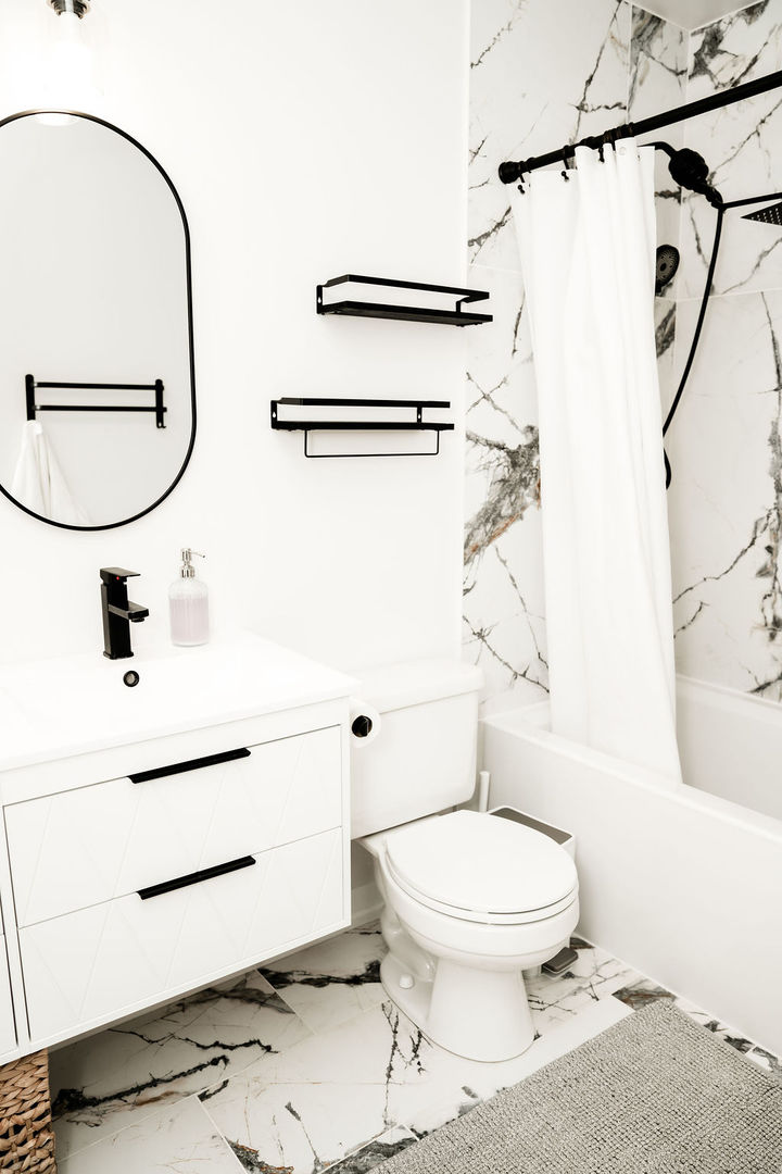 3389 Ravinia Circle Aurora, IL 60504 - Photo 22 of 39 a bathroom with a toilet sink and shower