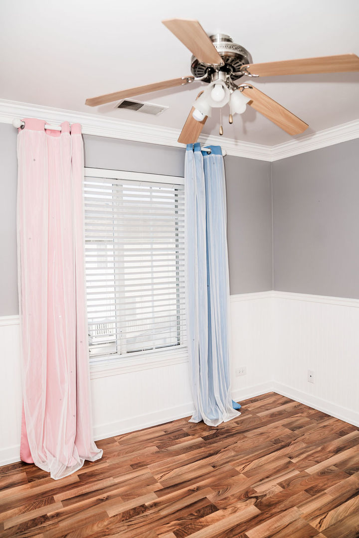 3389 Ravinia Circle Aurora, IL 60504 - Photo 26 of 39 a view of a bedroom window and wooden floor