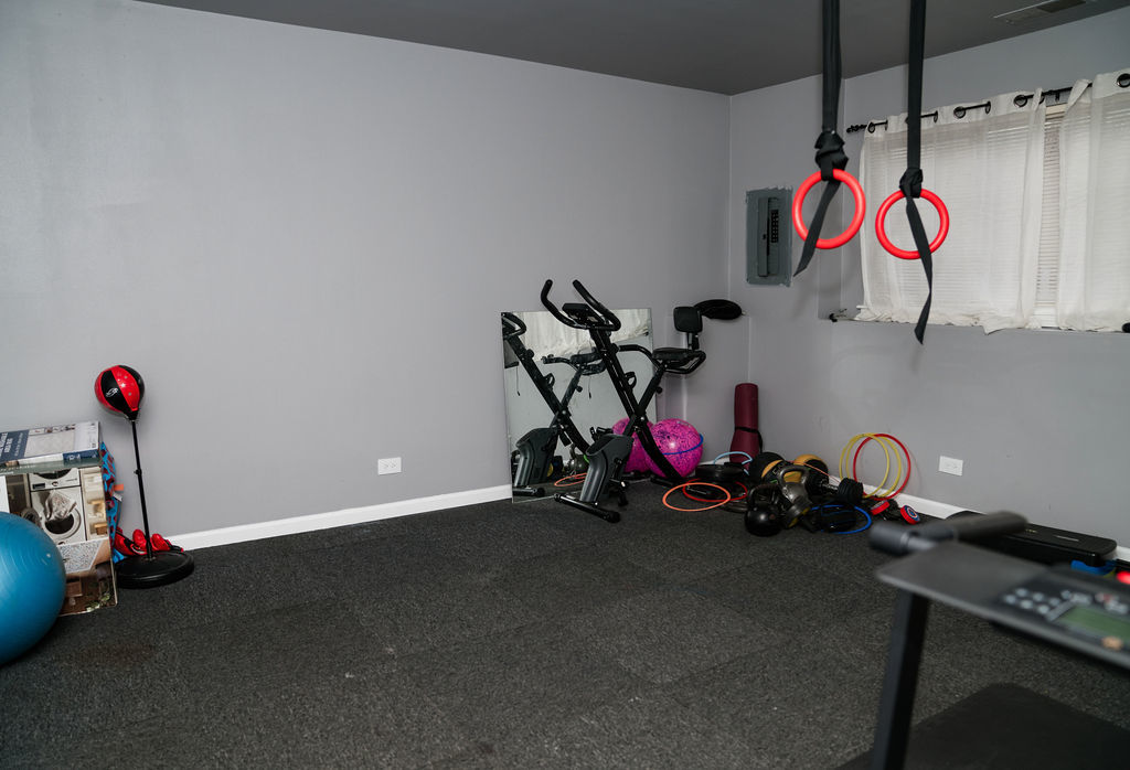 3389 Ravinia Circle Aurora, IL 60504 - Photo 35 of 39 a view of a room with gym equipment