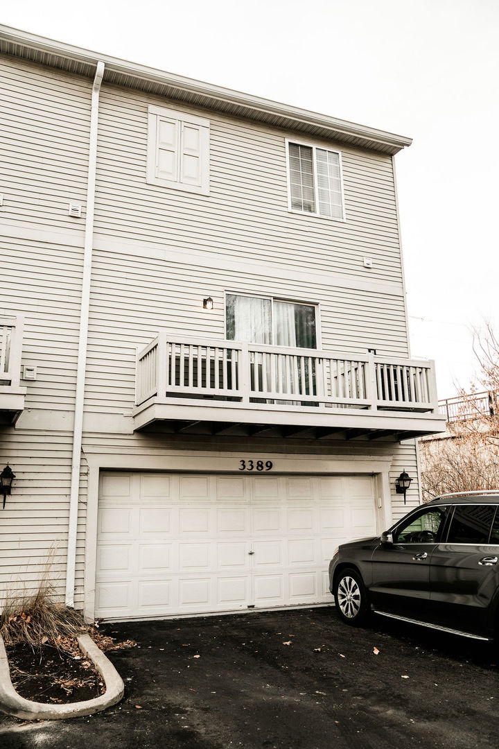 3389 Ravinia Circle Aurora, IL 60504 - Photo 37 of 39 a view of a house with a roof deck
