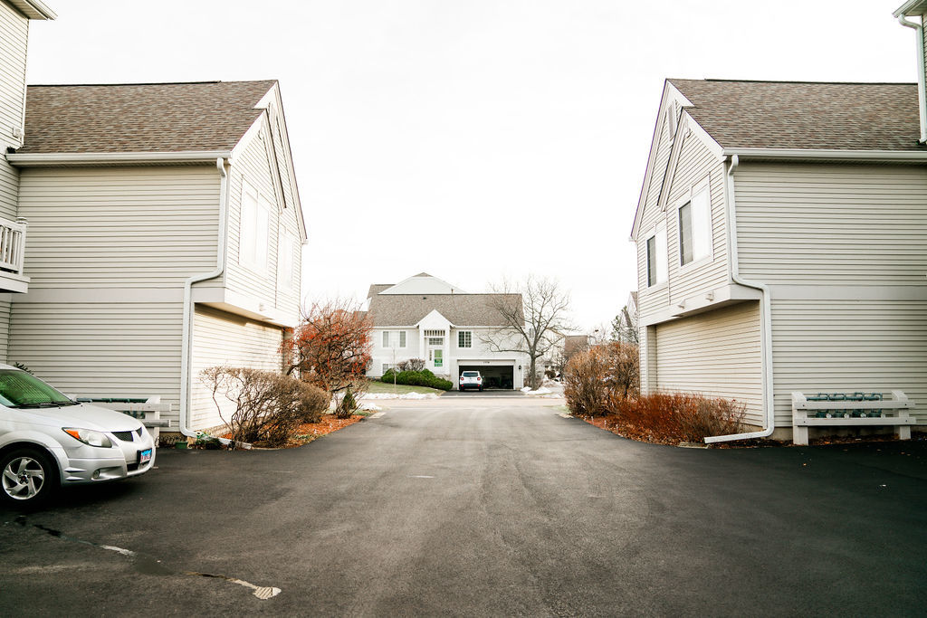 3389 Ravinia Circle Aurora, IL 60504 - Photo 38 of 39 a view of a car parked in front of a house