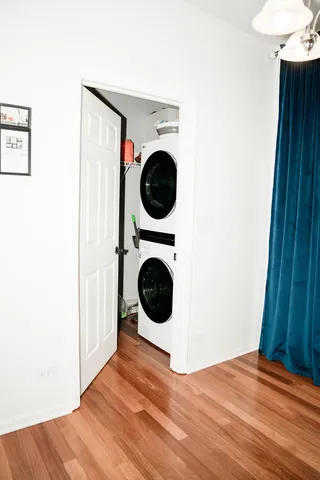 a view of a bedroom and utility room