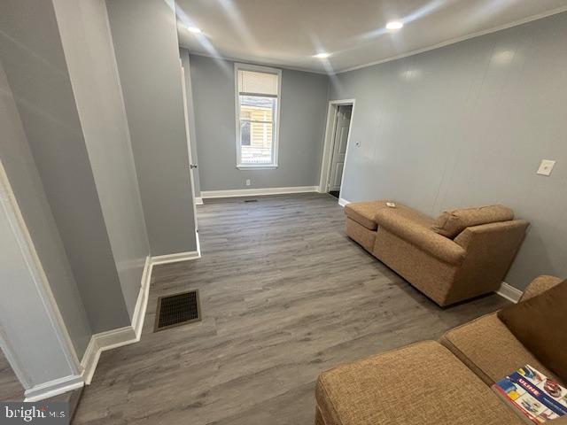 3802 Parkside Drive Baltimore, MD 21206 - Photo 4 of 11 a living room with furniture and a fireplace