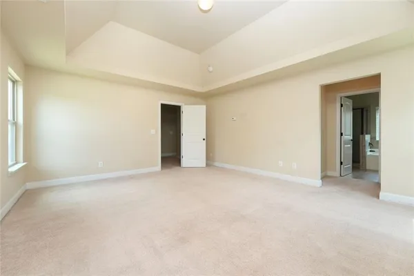 a bathroom with a shower and a tub
