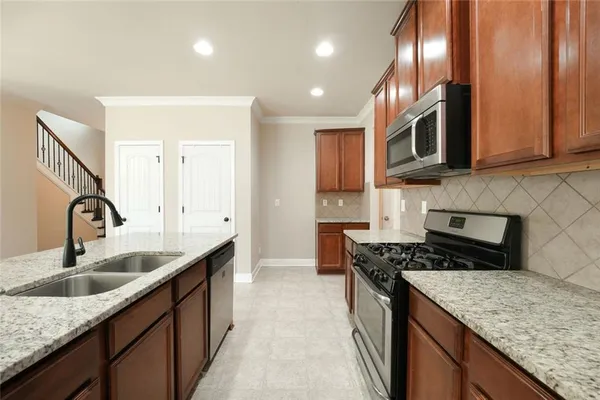 a sink with granite countertop a sink and vanity