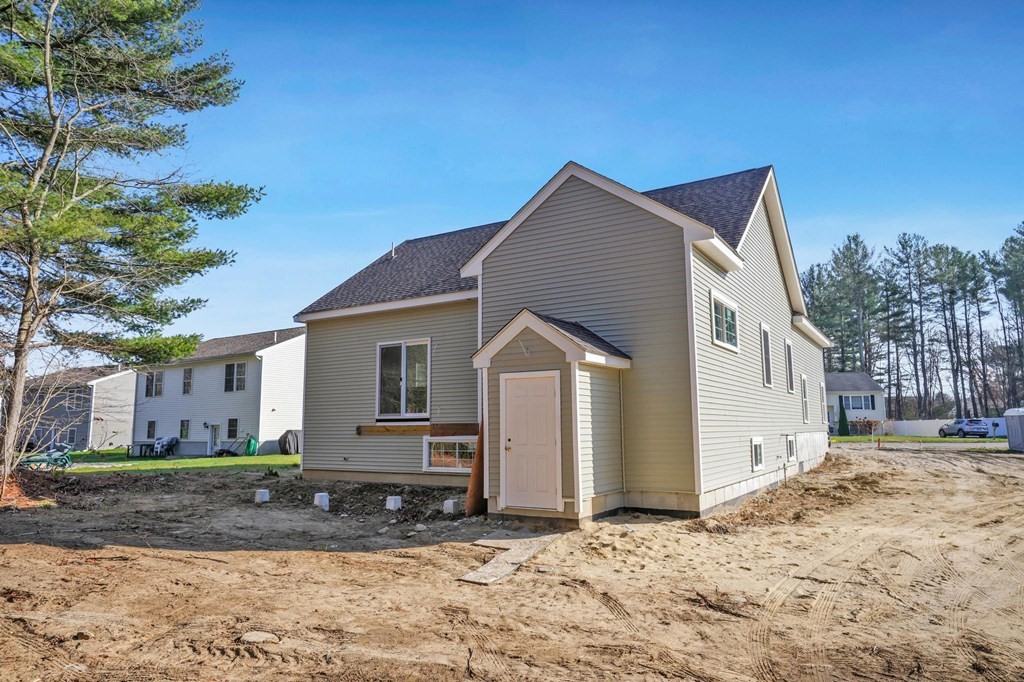 964 Stonegate Landing Dighton, MA 02764 - Photo 5 of 17 a view of a house with a yard