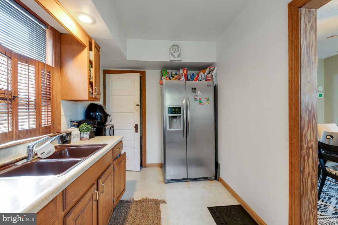 7046 Dunbar Road Baltimore, MD 21222 - Photo 12 of 37 SS refrigerator