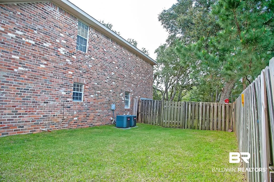 6580 Spaniel Drive Daphne, AL 36527 - Photo 32 of 34 Side Yard