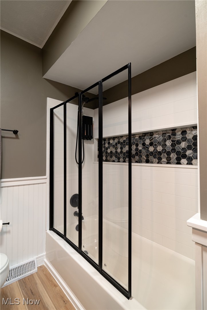 37340 Capel Road Grafton, OH 44044 - Photo 26 of 50 Remodeled tiled bathtub with glass shower doors