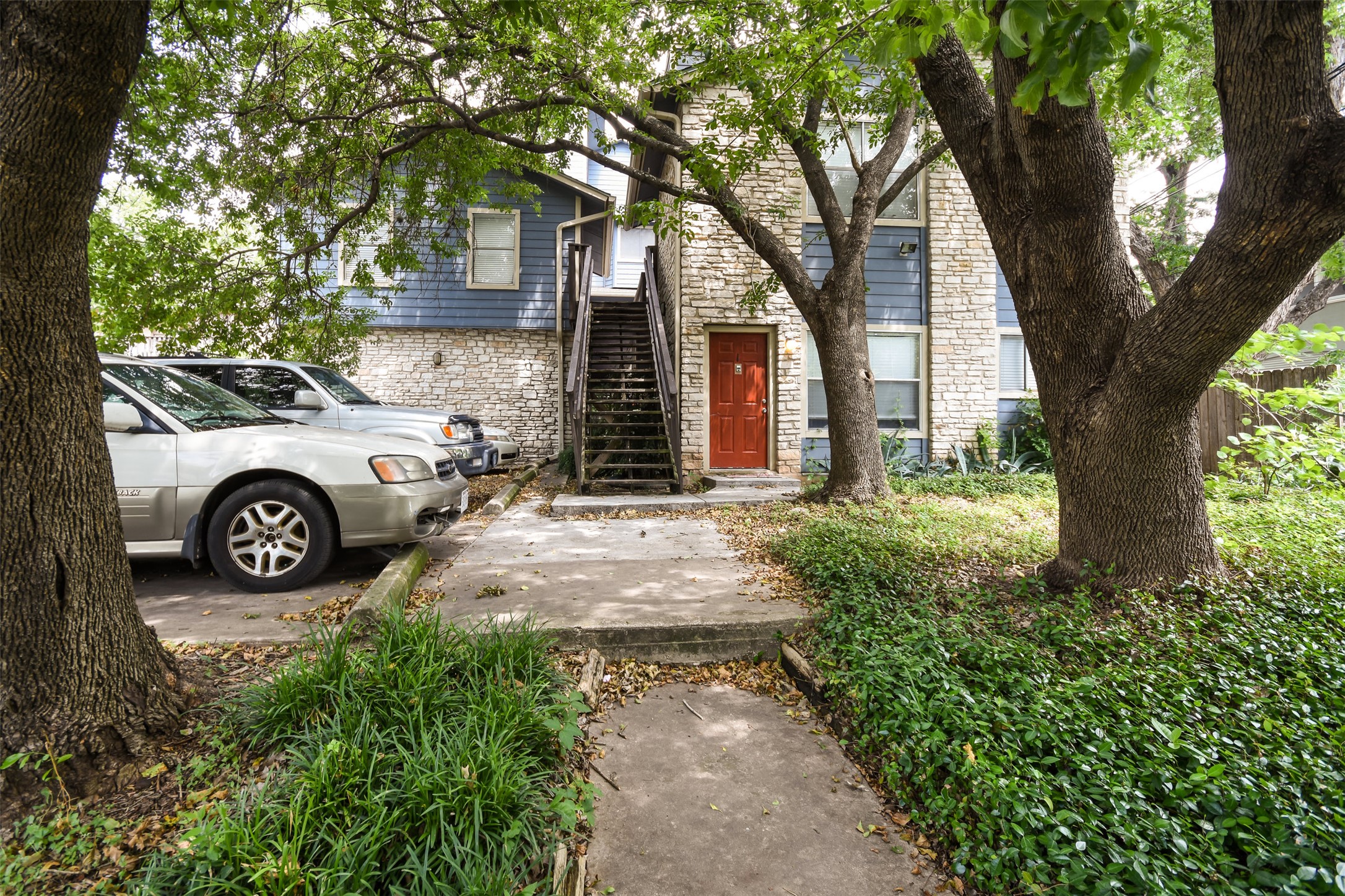 a car parked in front of a house