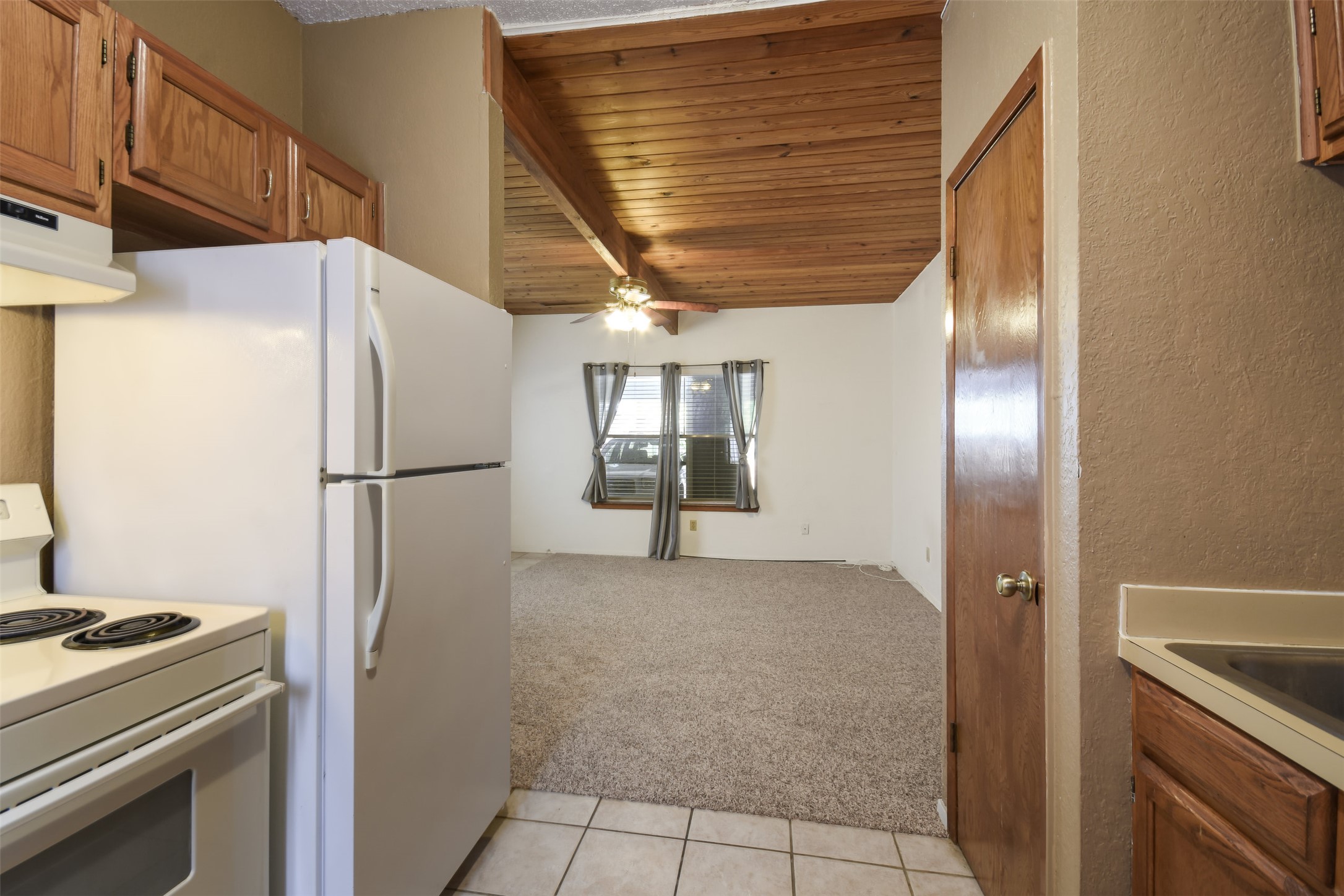 3004 Speedway, Unit 2 Austin, TX 78705 - Photo 13 of 20 a view of a kitchen with a stove