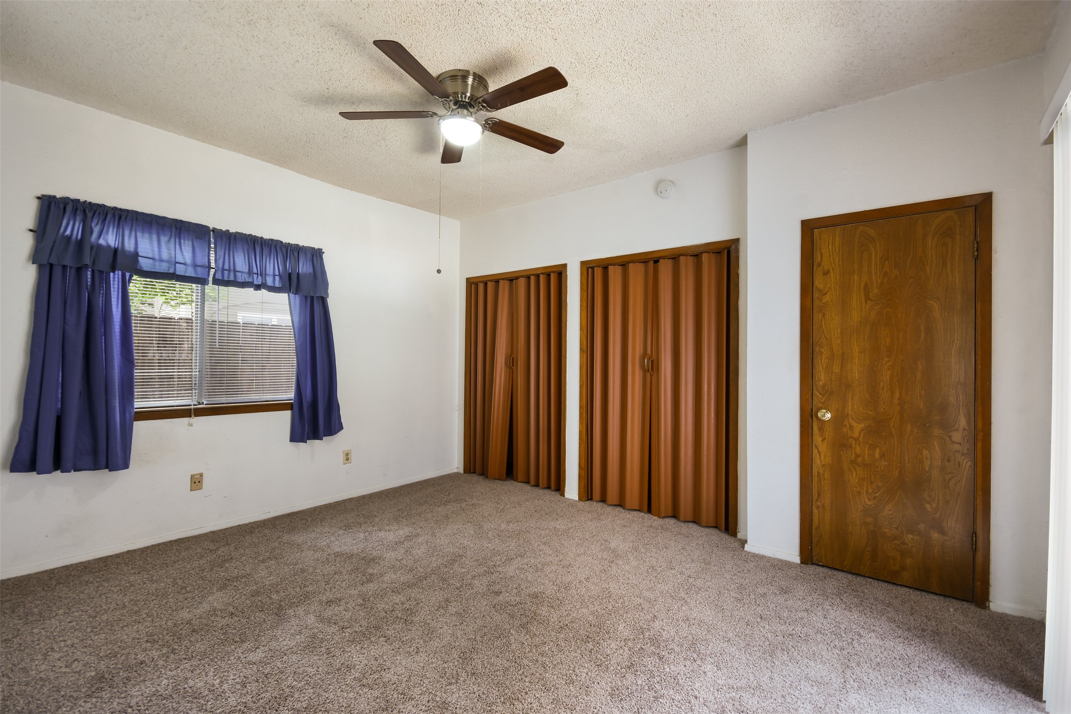 3004 Speedway, Unit 2 Austin, TX 78705 - Photo 14 of 20 a view of an empty room with a window