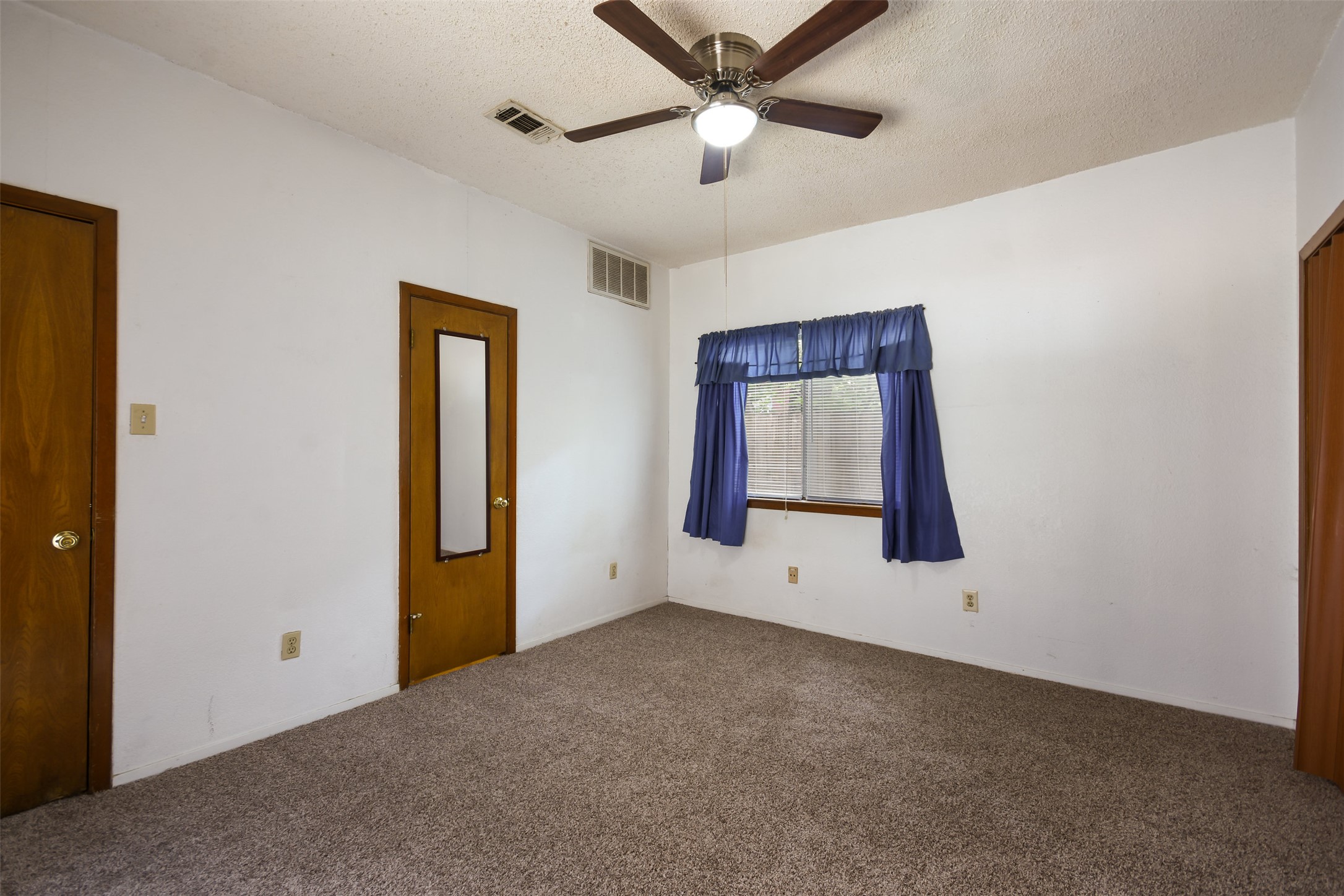3004 Speedway, Unit 2 Austin, TX 78705 - Photo 15 of 20 a view of an empty room with window