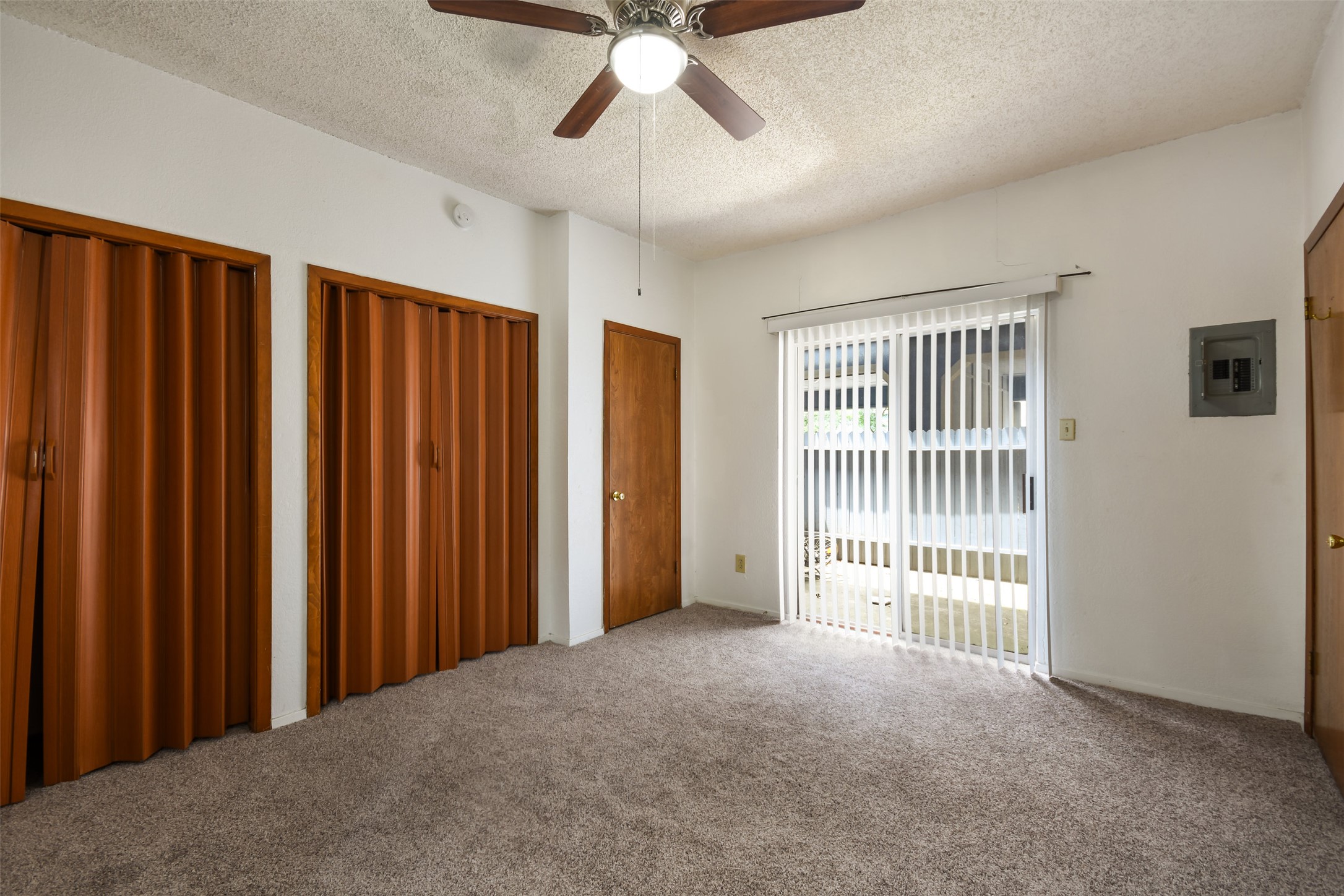3004 Speedway, Unit 2 Austin, TX 78705 - Photo 17 of 20 a view of a livingroom with a ceiling fan and window