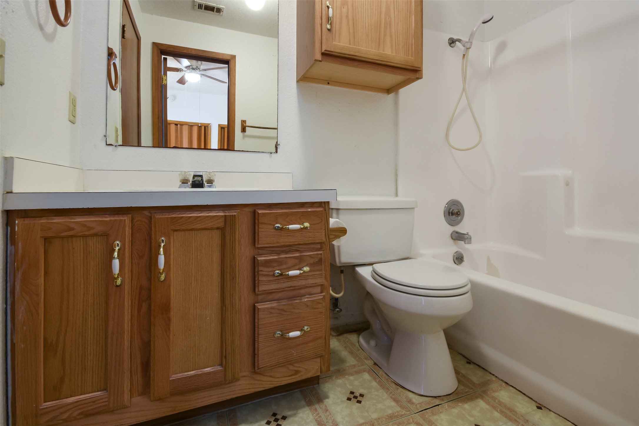 3004 Speedway, Unit 2 Austin, TX 78705 - Photo 18 of 20 a bathroom with a toilet sink and mirror
