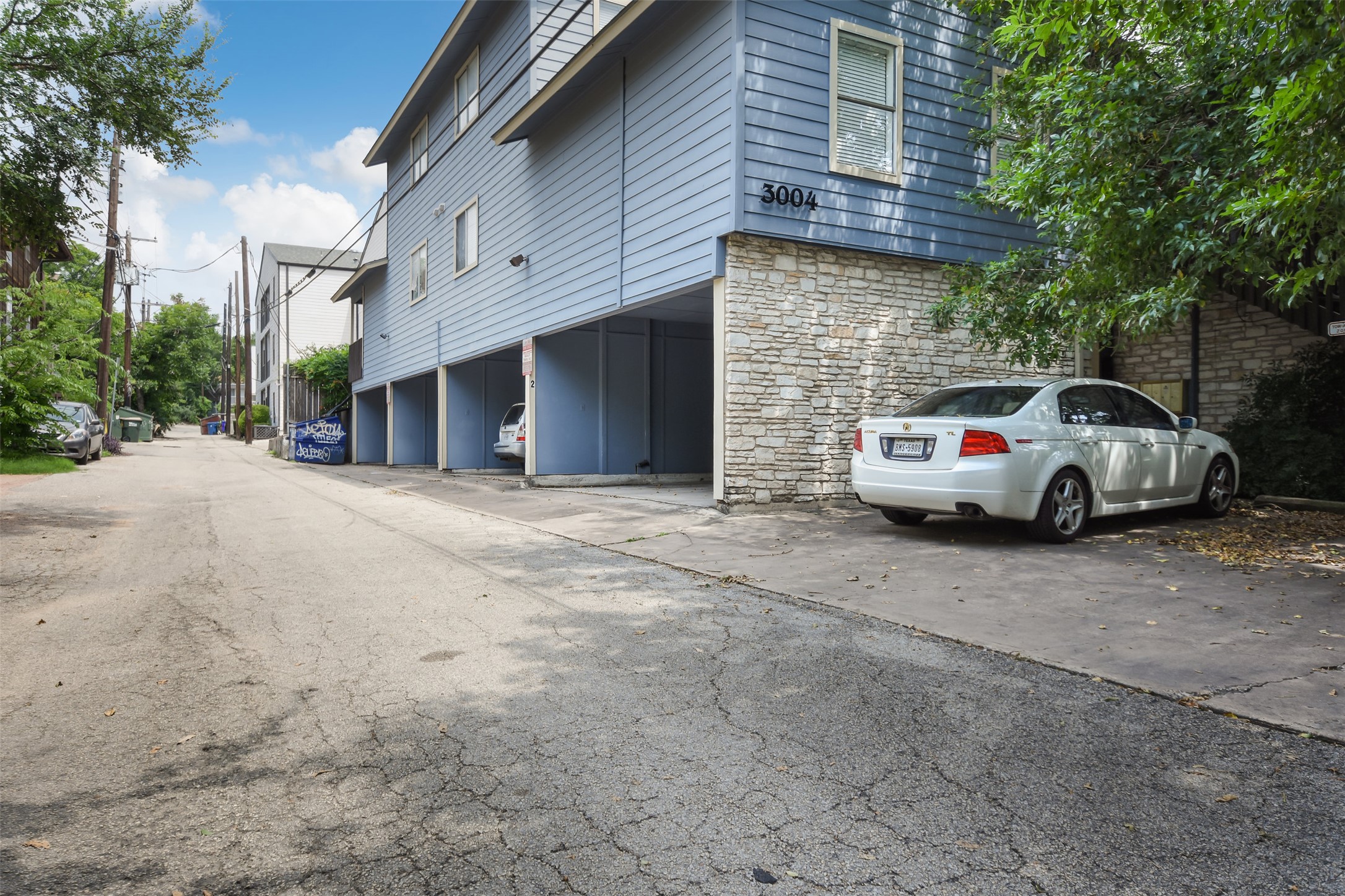 3004 Speedway, Unit 2 Austin, TX 78705 - Photo 3 of 20 a view of a car park in front of house