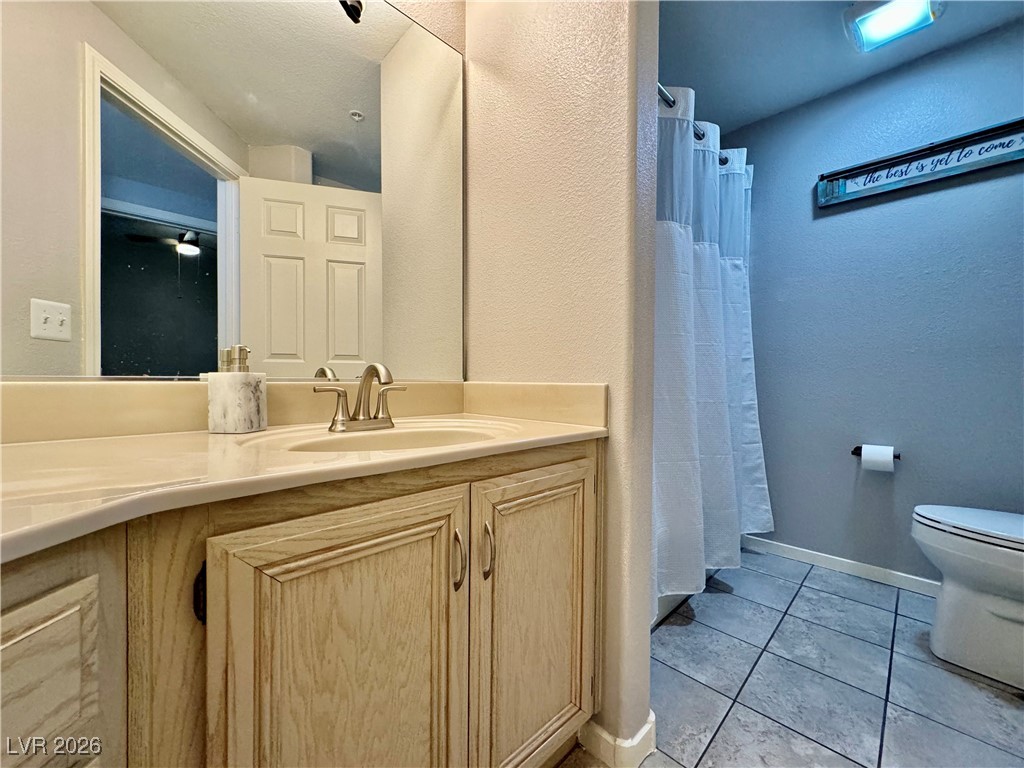 7151 South Durango Drive, Unit 307 Las Vegas, NV 89113 - Photo 14 of 17 Secondary Hall Bathroom with a Bathtub/Shower Combo