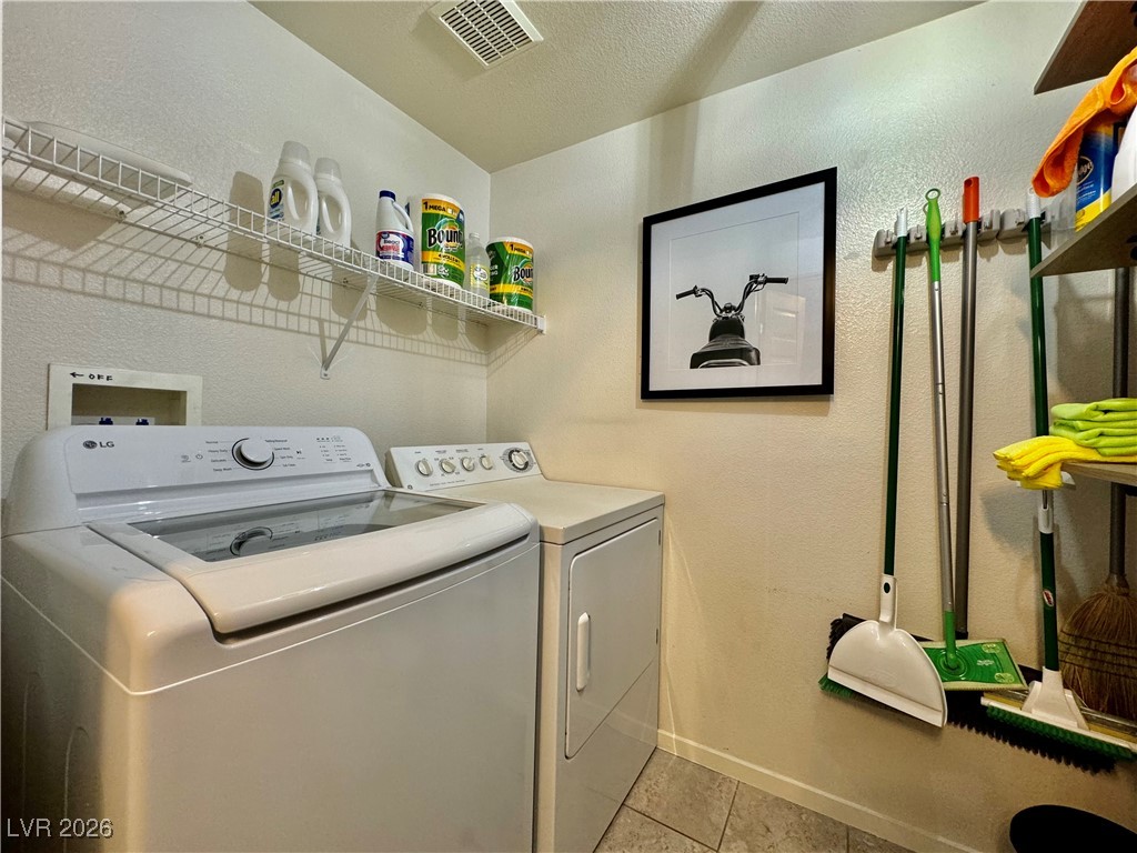 7151 South Durango Drive, Unit 307 Las Vegas, NV 89113 - Photo 6 of 17 Separate Laundry Room which includes Washer, Dryer & extra storage space