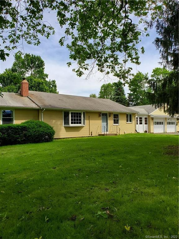 38 Ratley Road Suffield, CT 06093 - Photo 1 of 1 a front view of a house with a garden