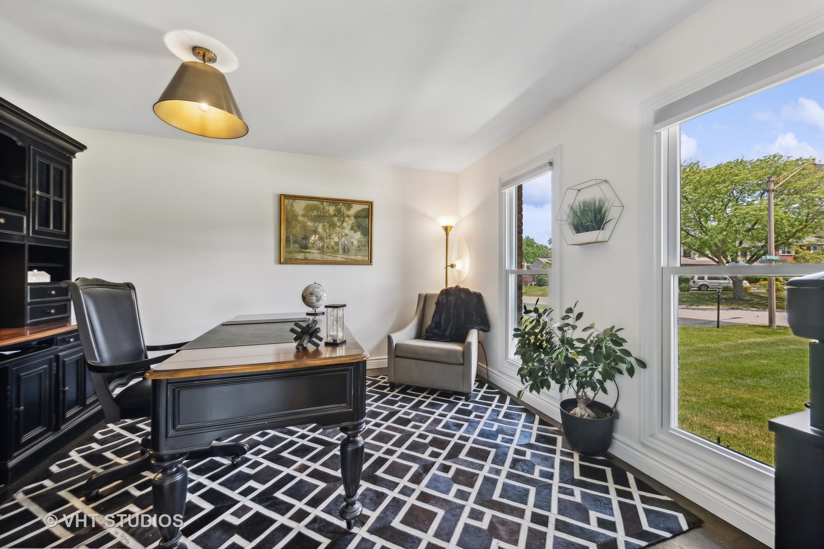 8460 Dolfor Cove Burr Ridge, IL 60527 - Photo 12 of 32 a living room with a couch and a large window