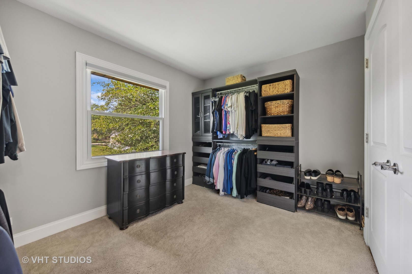 8460 Dolfor Cove Burr Ridge, IL 60527 - Photo 17 of 32 a view of a livingroom with furniture and closet