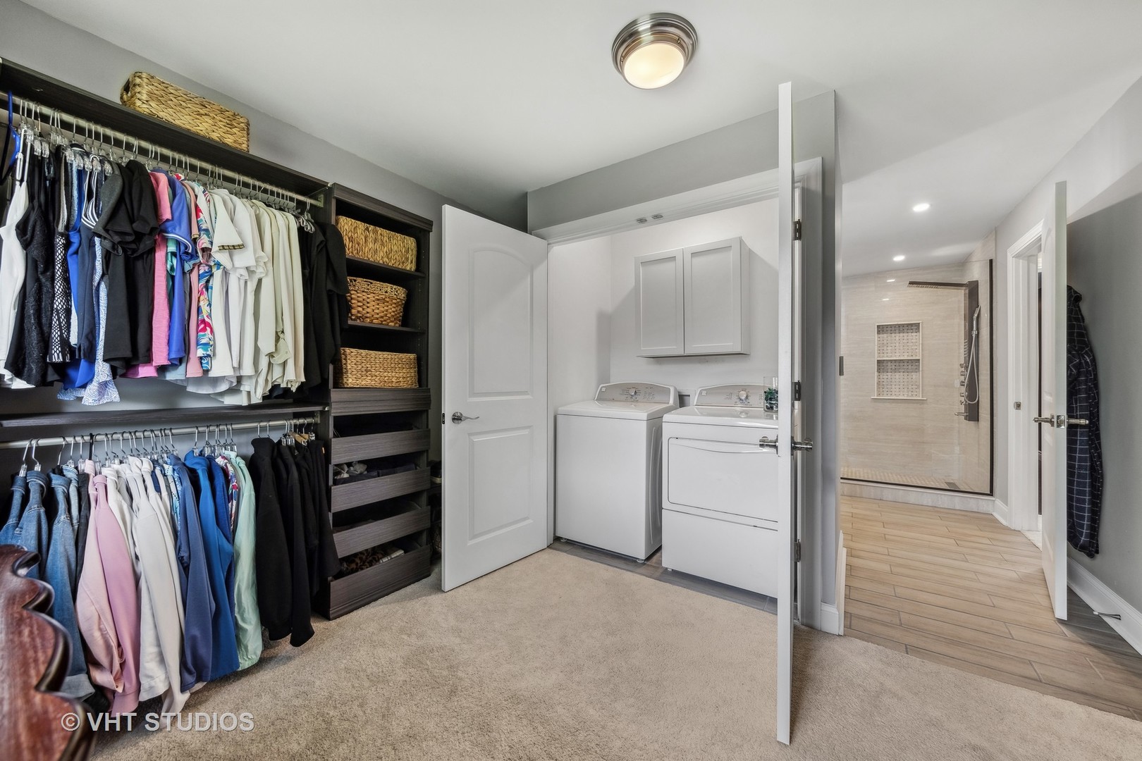 8460 Dolfor Cove Burr Ridge, IL 60527 - Photo 18 of 32 a view of walk in closet with clothes and shoes