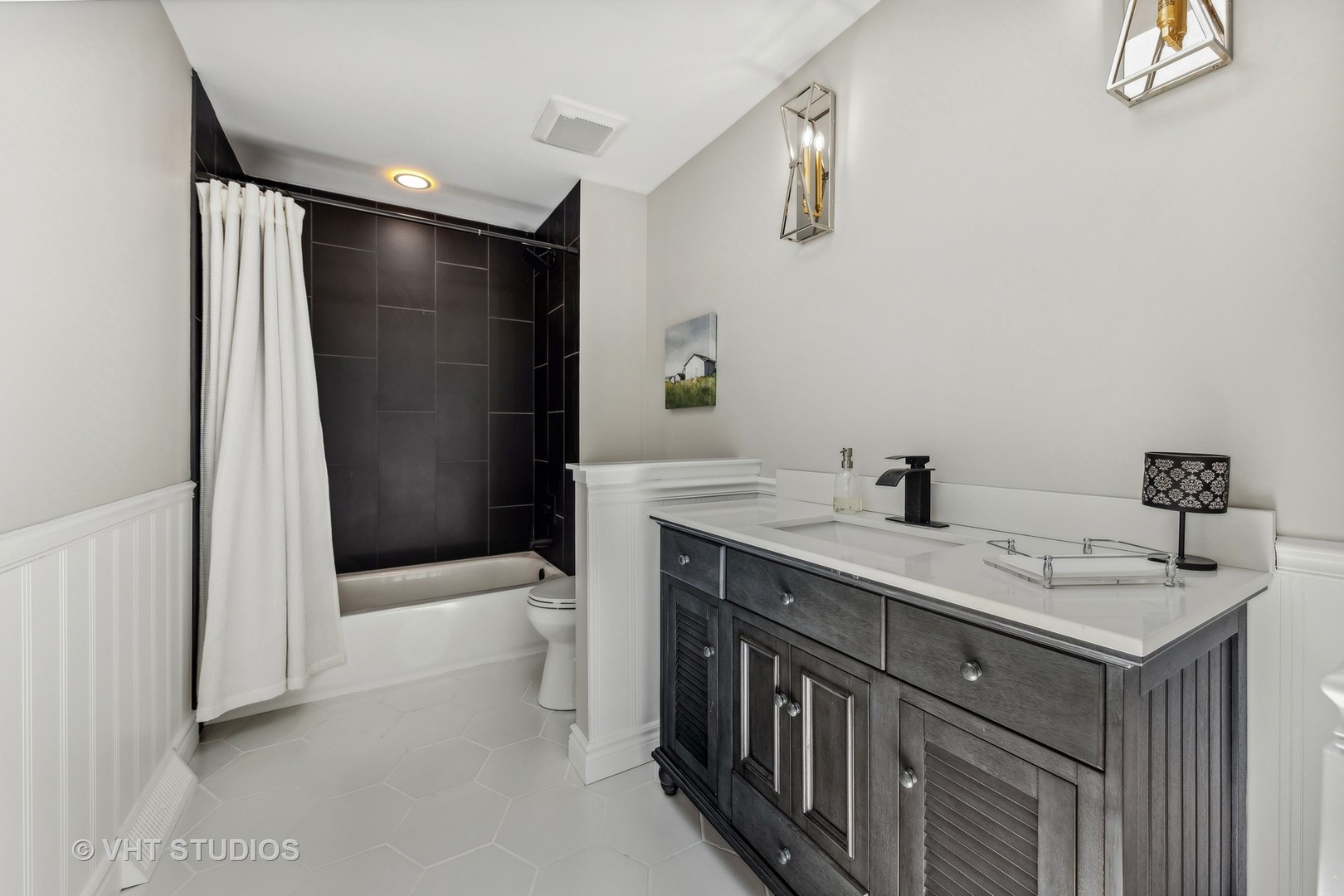 8460 Dolfor Cove Burr Ridge, IL 60527 - Photo 19 of 32 a bathroom with a sink a toilet and shower