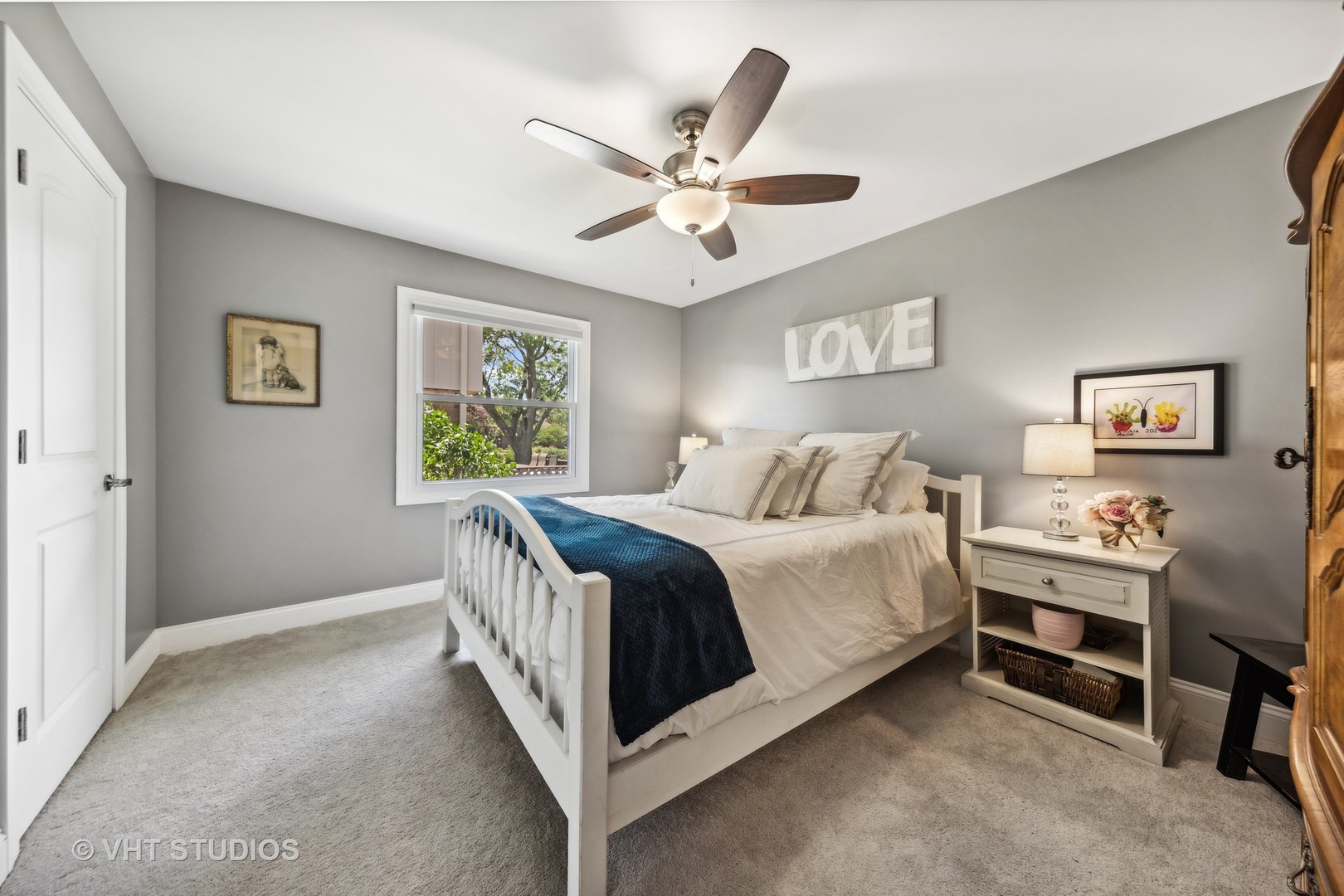 8460 Dolfor Cove Burr Ridge, IL 60527 - Photo 20 of 32 a bedroom with a bed and a window