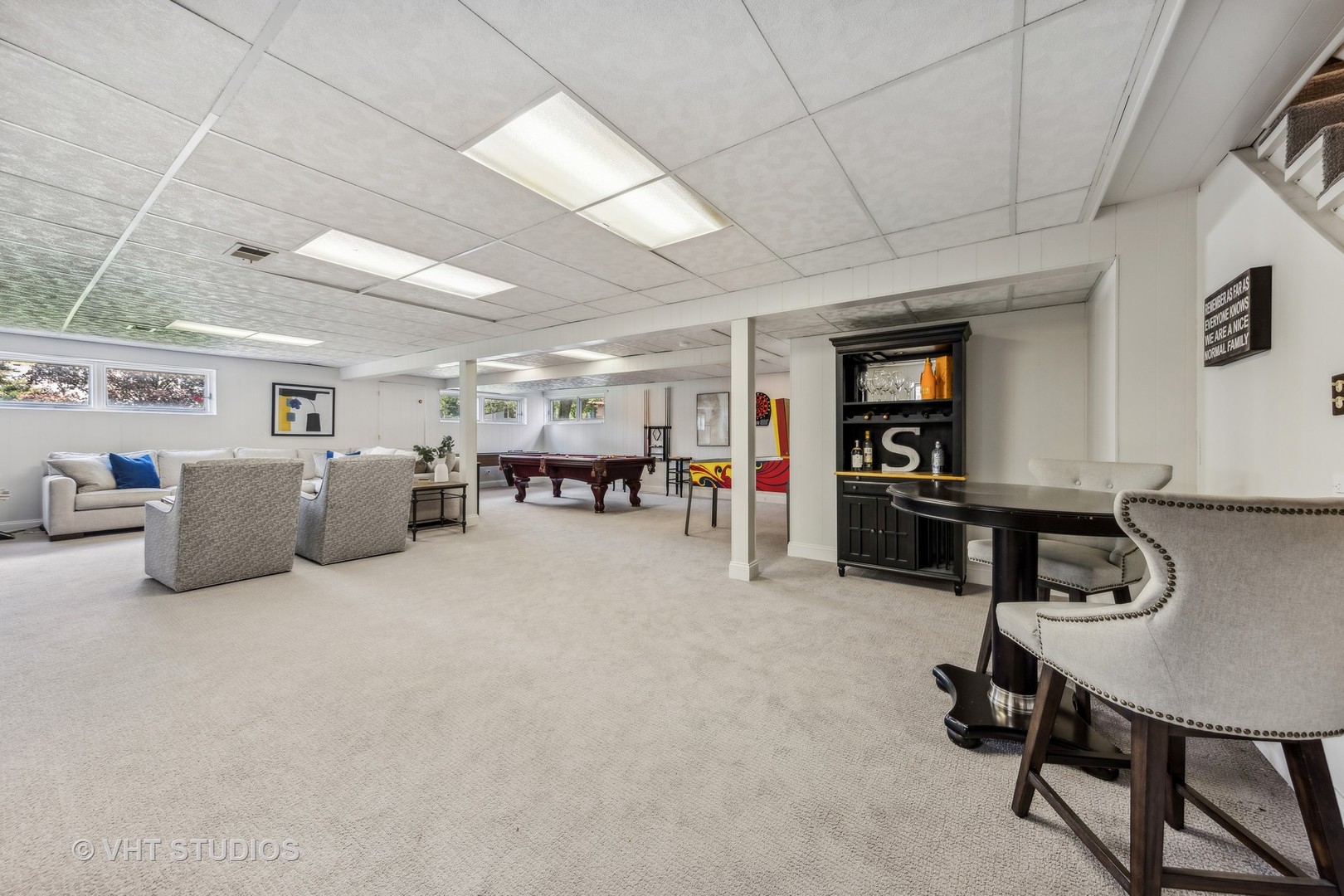 8460 Dolfor Cove Burr Ridge, IL 60527 - Photo 21 of 32 a living room with furniture and a flat screen tv